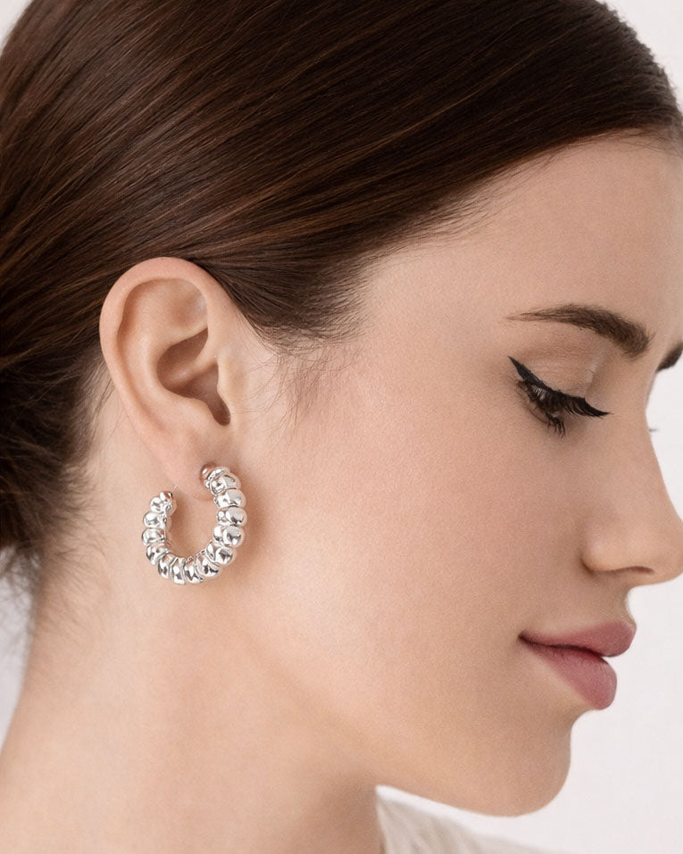 beaded hoop earrings silver plated brass on grey background