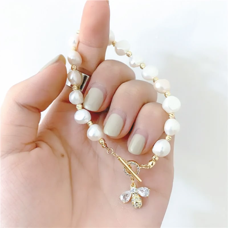 bee pearl beaded bracelet model hand
