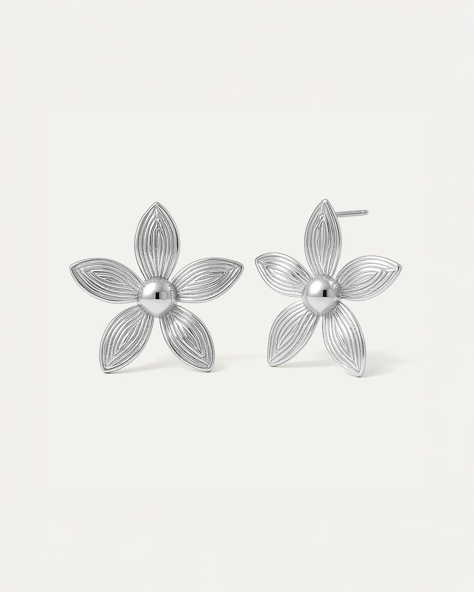 Silver flower-shaped stud earrings with five detailed petals – Bloom Petal Studs by Jadejuri, feminine and elegant.