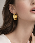 18k gold plated bold hoop earrings worn by model, modern minimalist women style