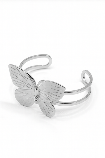 Butterfly Embrace Cuff bracelet in silver-plated brass with detailed butterfly design and open cuff structure
