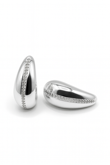 Celeste Arc Studs in silverplated brass with sleek crescent arc design