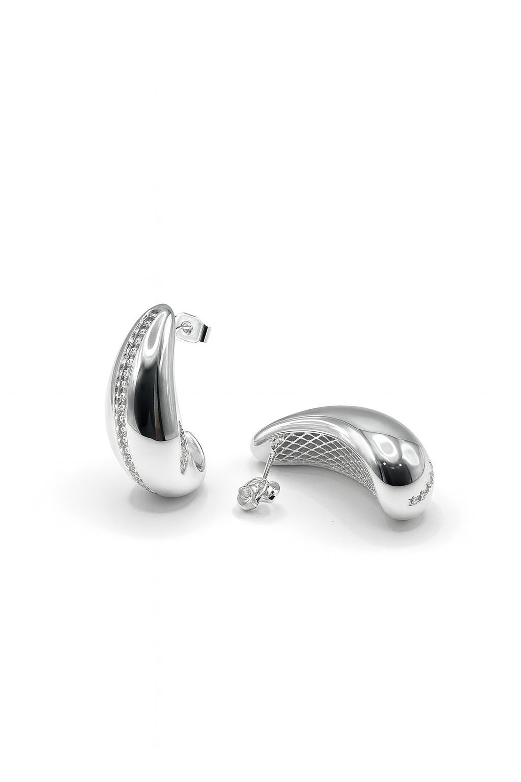 Celeste Arc Studs in silverplated brass with sleek crescent arc design