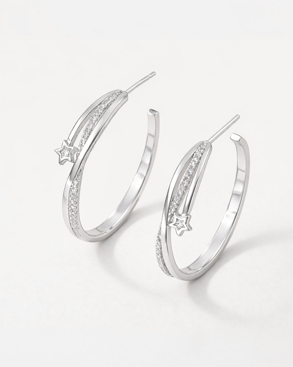 Silver star hoop earrings with crystal detail minimalist jewelry design
