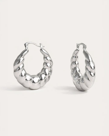 Chunky Spiral Hoops in polished silver with twisted sculptural design – Jadejuri