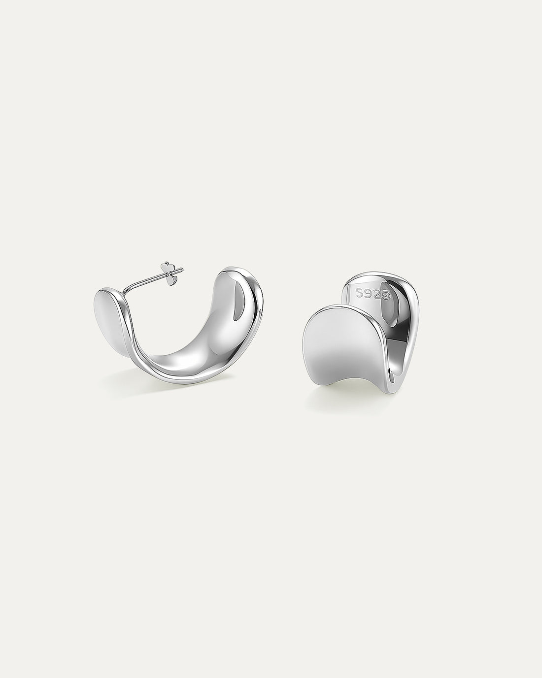 Sterling Silver 925 crescent hoop earrings – rhodium plated sculptural design by Jadejuri.

