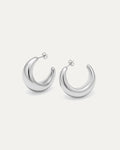 Pair of silver hoop earrings on a white background