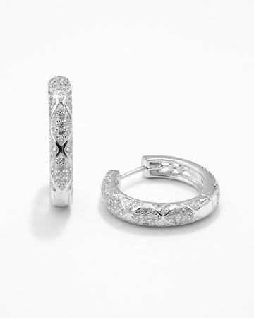 Silver pavé hoop earrings with diamond-like detailing and polished silver finish