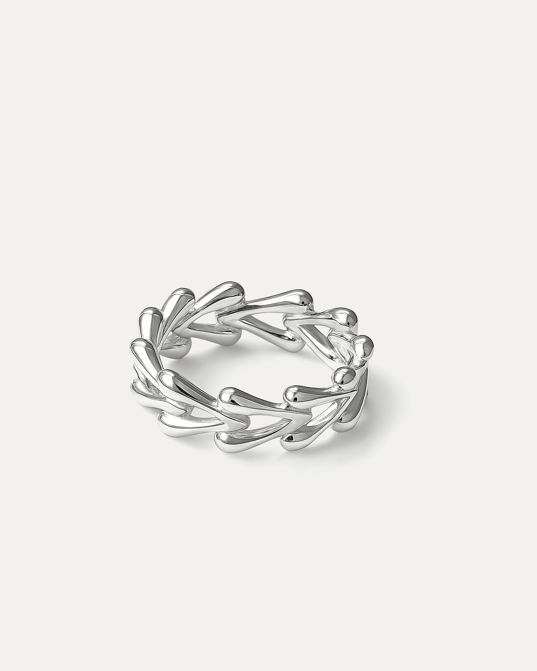 delicate silver ring with teardrop vine design on white background