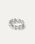 delicate silver ring with teardrop vine design on white background