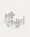 Flora Bloom Cuff in silver-plated brass featuring detailed flower motifs in an open cuff design
