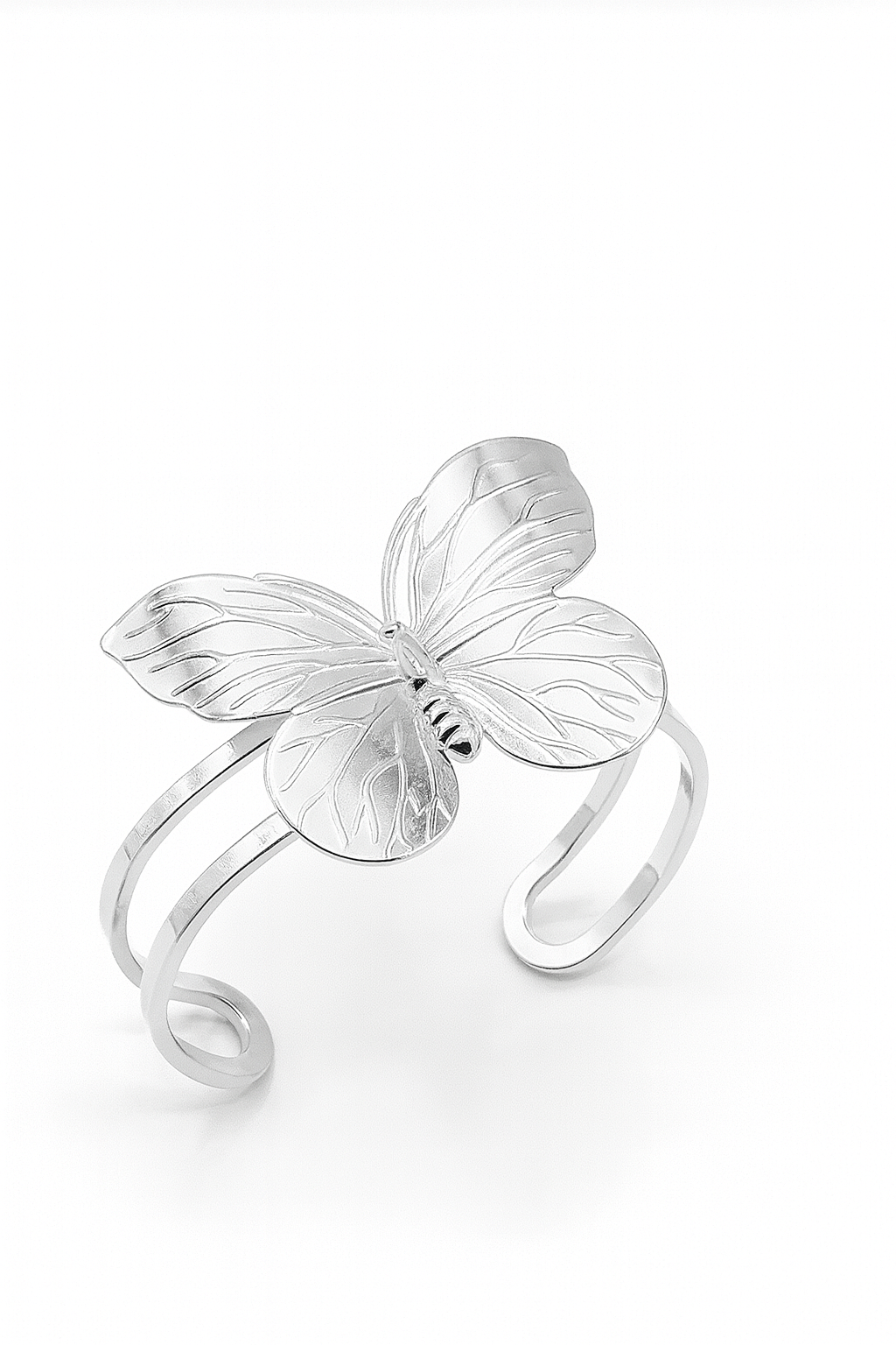 Butterfly Embrace Cuff bracelet in silver-plated brass with detailed butterfly design and open cuff structure
