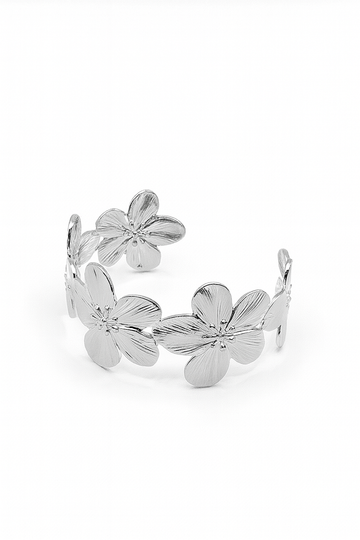 Flora Bloom Cuff in silver-plated brass featuring detailed flower motifs in an open cuff design