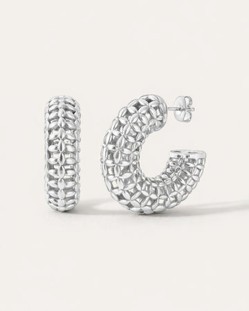 Silver-plated floral lattice hoop earrings with textured petal-inspired design, modern sculptural style by Jadejuri