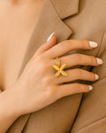 Gold flower ring with four elongated petals – Flora Petal Ring by Jadejuri