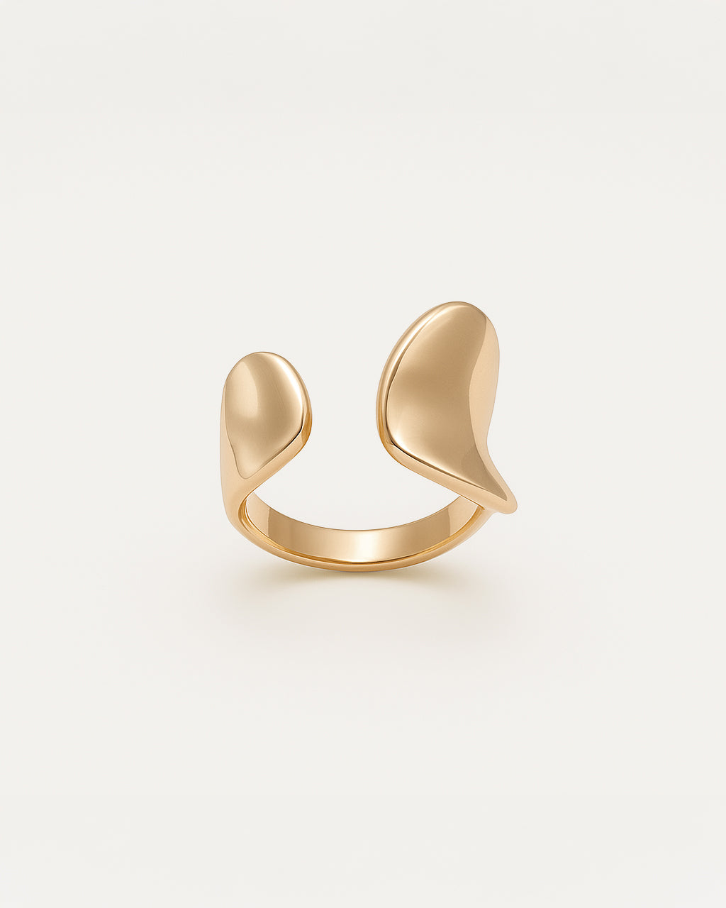 Minimal gold statement ring with open band and sculptural curved ends