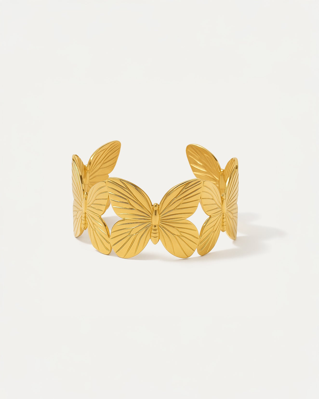 Golden Butterfly Cuff Bracelet with engraved wings in gold finish – Jadejuri