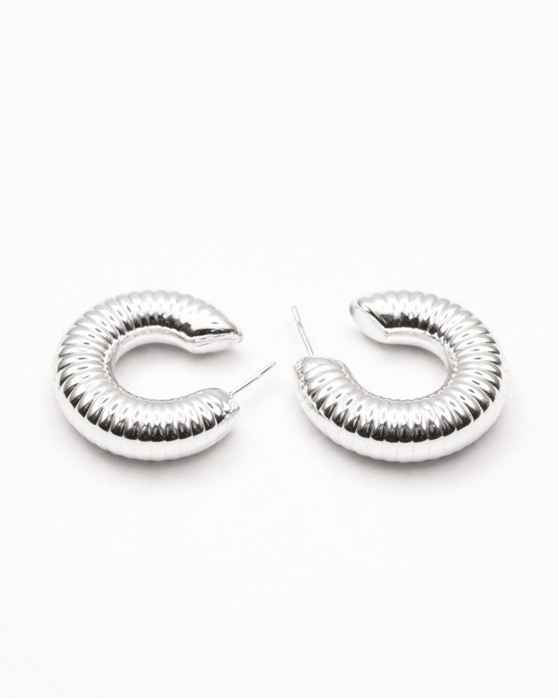 Silver grooved dome hoop earrings with ribbed curved design and polished silver-plated finish