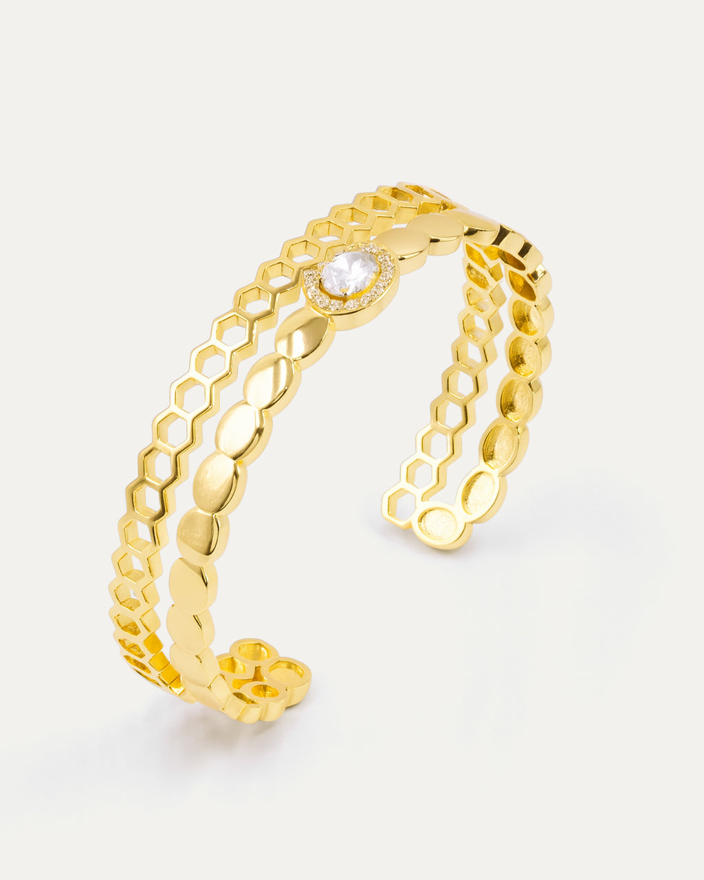 Honey Halo cuff bracelet in 18k gold-plated brass with honeycomb pattern and sparkling stone accent