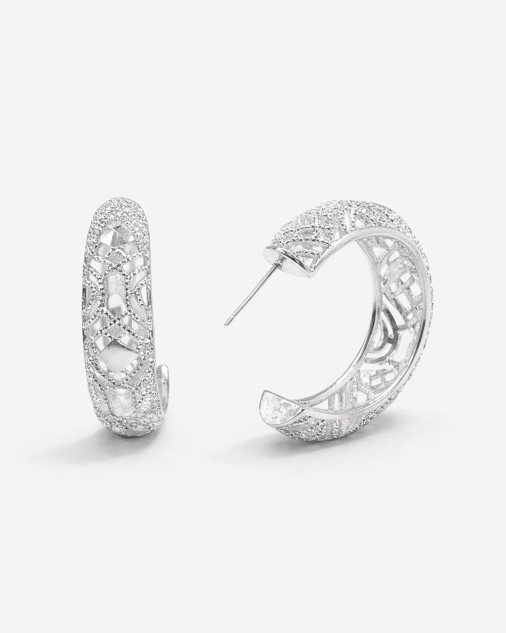 Silver lattice hoop earrings with openwork geometric pattern and polished silver finish