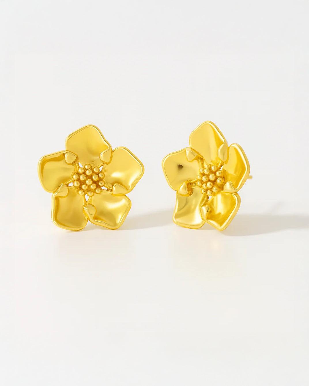 18K gold-plated lily flower stud earrings with sculpted petals and polished floral design