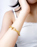 Gold chain bracelet with elongated links and statement clasp – Jadejuri