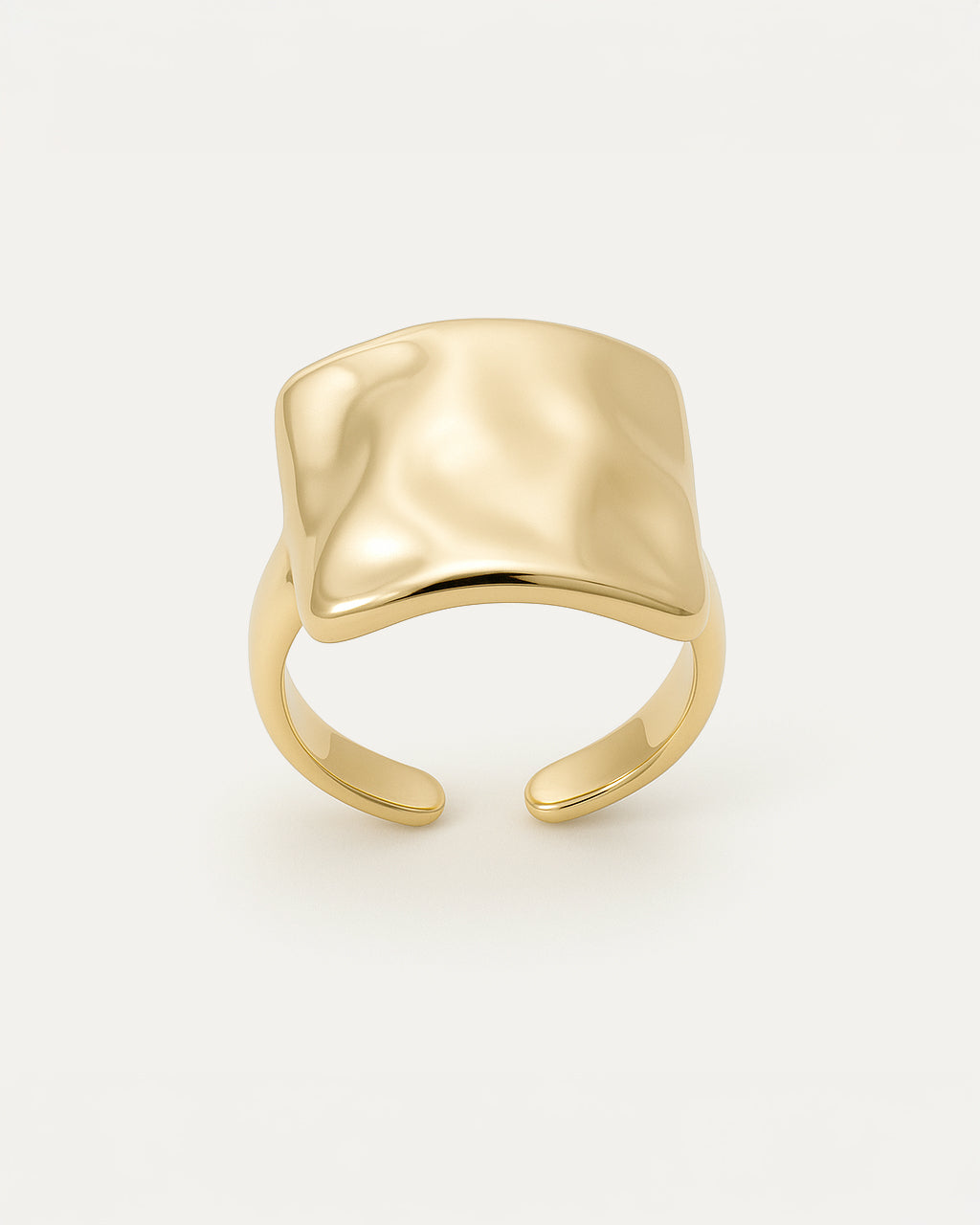 Bold gold statement ring with molten square sculptural face
