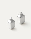 Silver-plated brass dome-shaped stud earrings with high-polish finish on neutral background