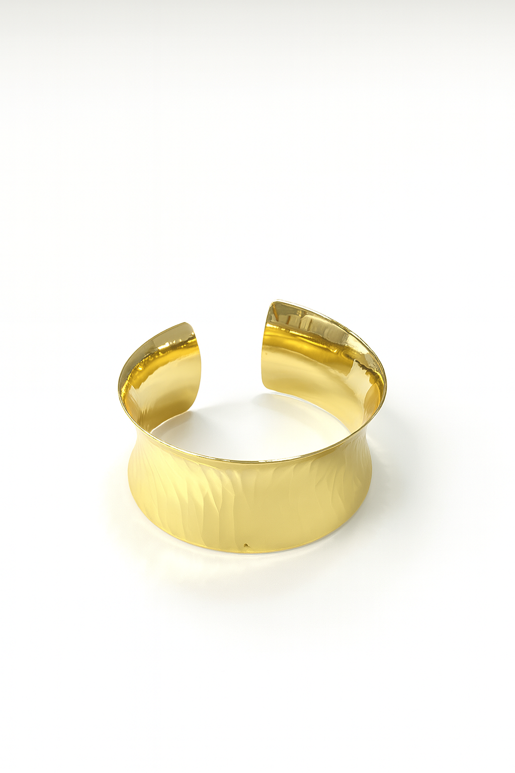 18K gold-plated brass wide cuff bracelet with hammered surface texture on white background
