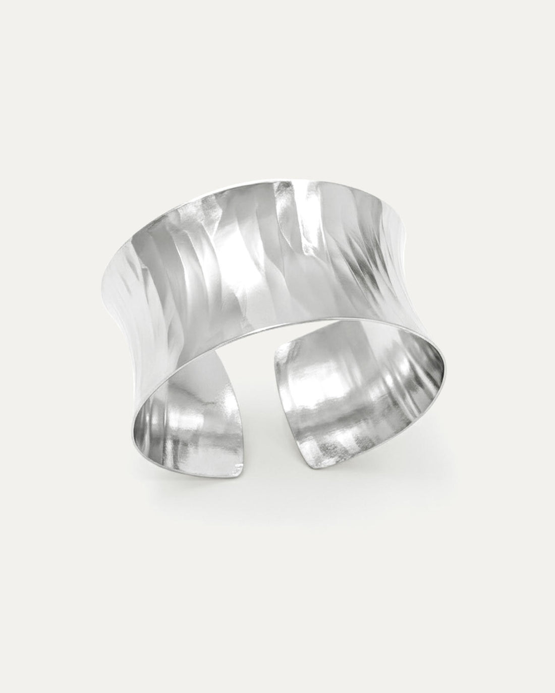 Lustre Hammered Cuff – Wide silver-plated brass cuff bracelet with hammered texture, modern statement jewelry.
