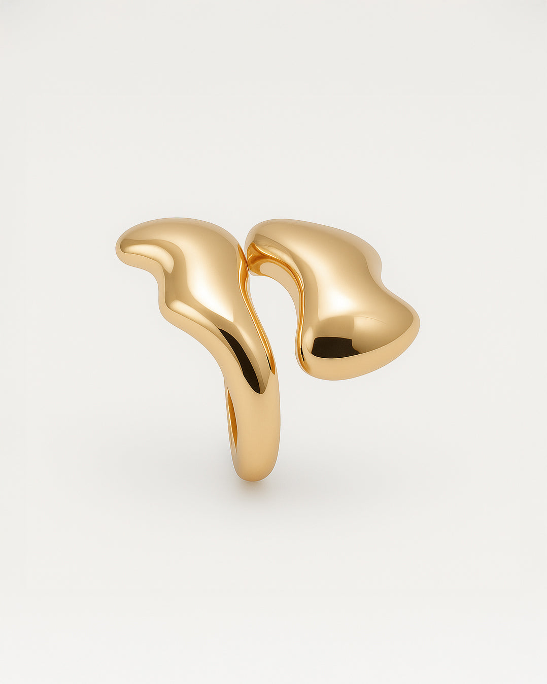 Gold statement ring with fluid melted design and open-front structure