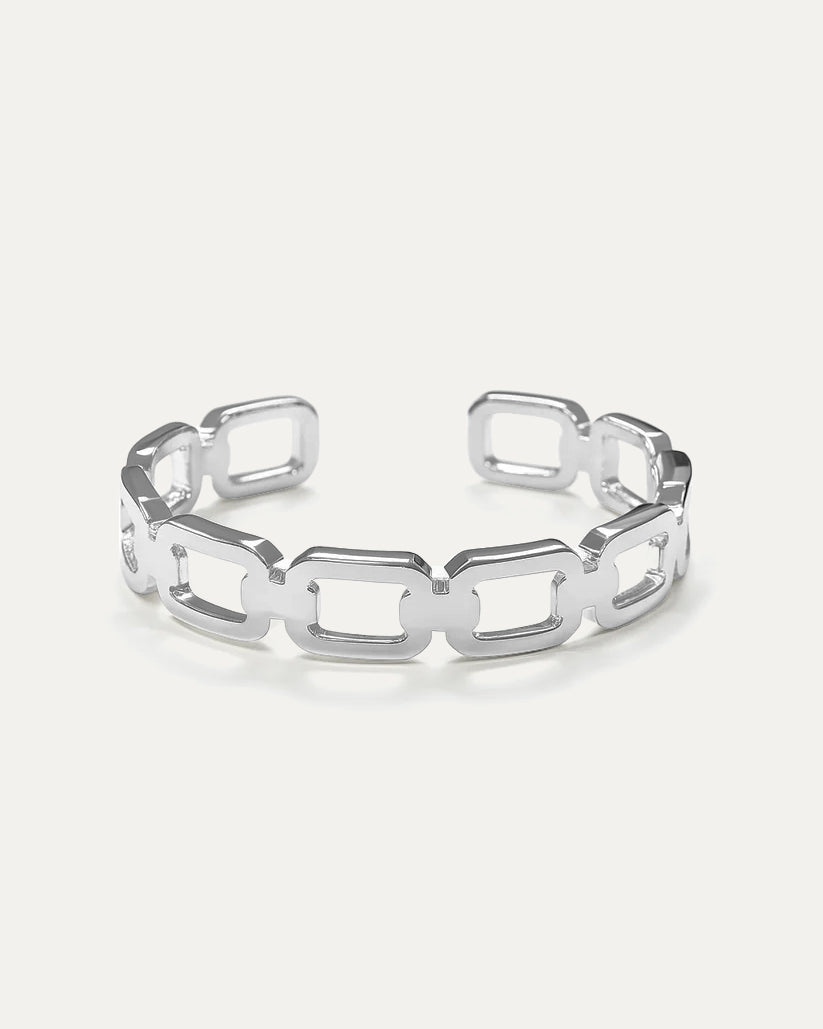 Silver chain-link bracelet on a white background