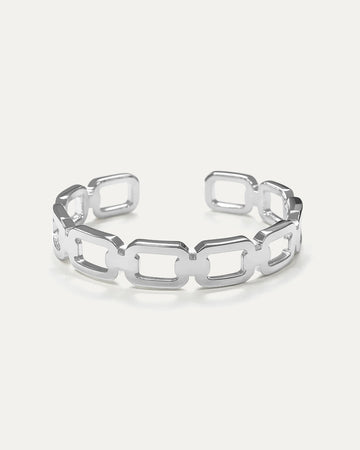 Silver chain-link bracelet on a white background