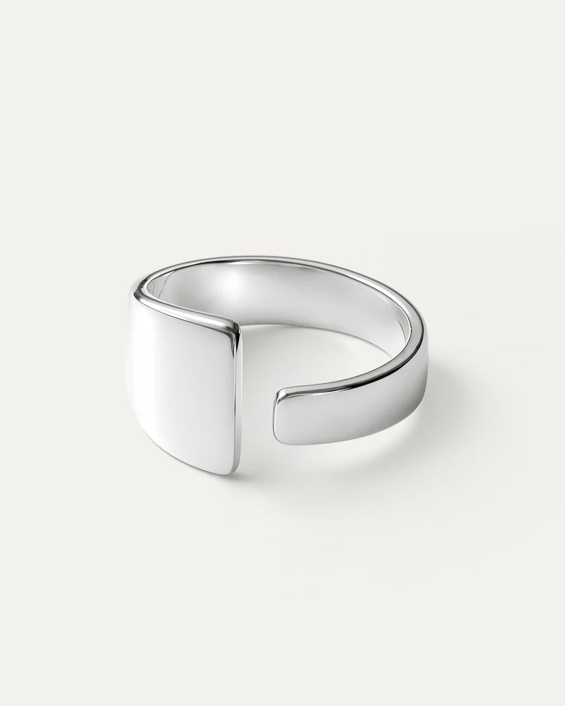Nova Shield Ring – adjustable silver-plated brass statement ring by Jadejuri, minimalist curved shield design.