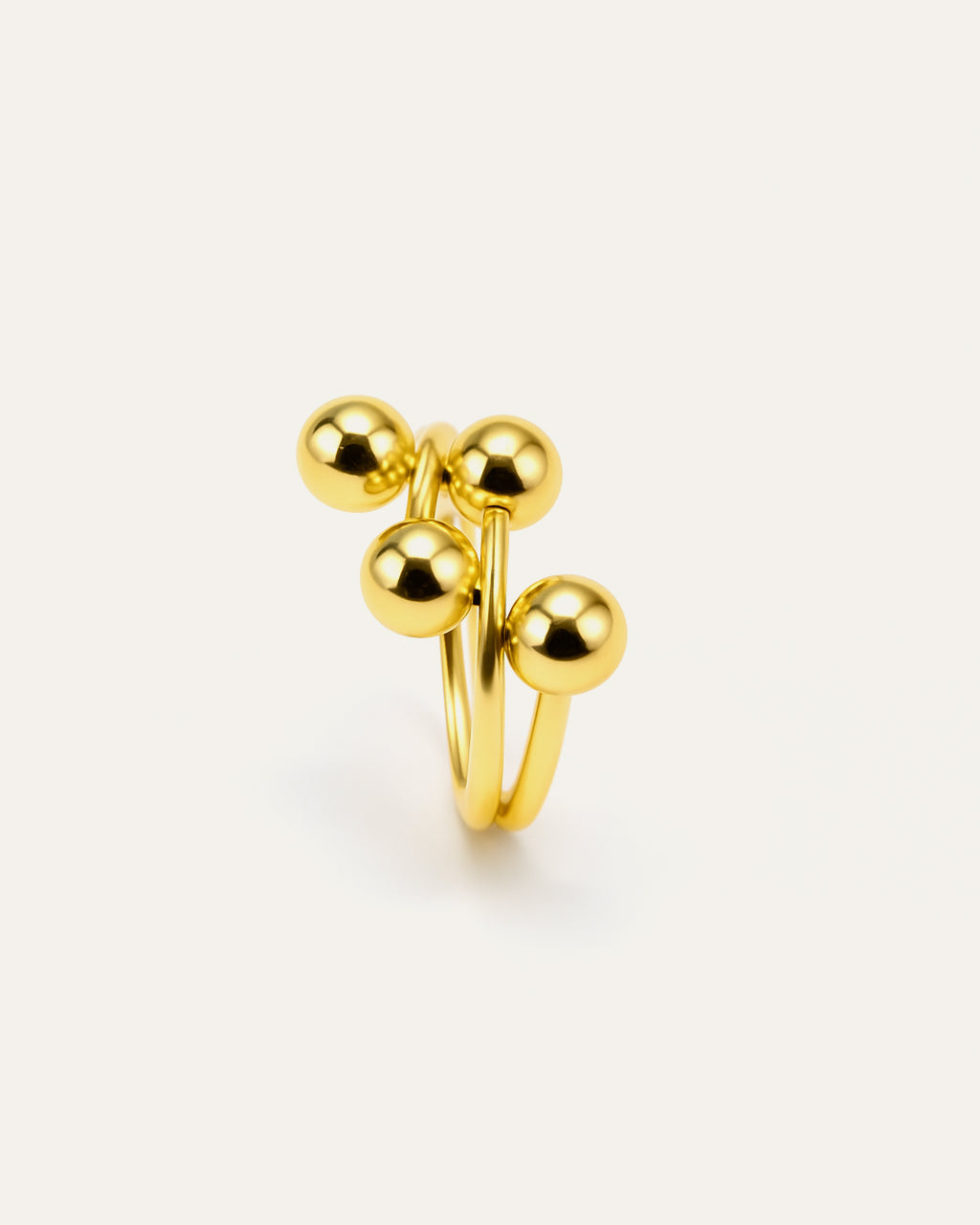 Orbit Cluster Ring in polished gold with four spherical orbs – Jadejuri