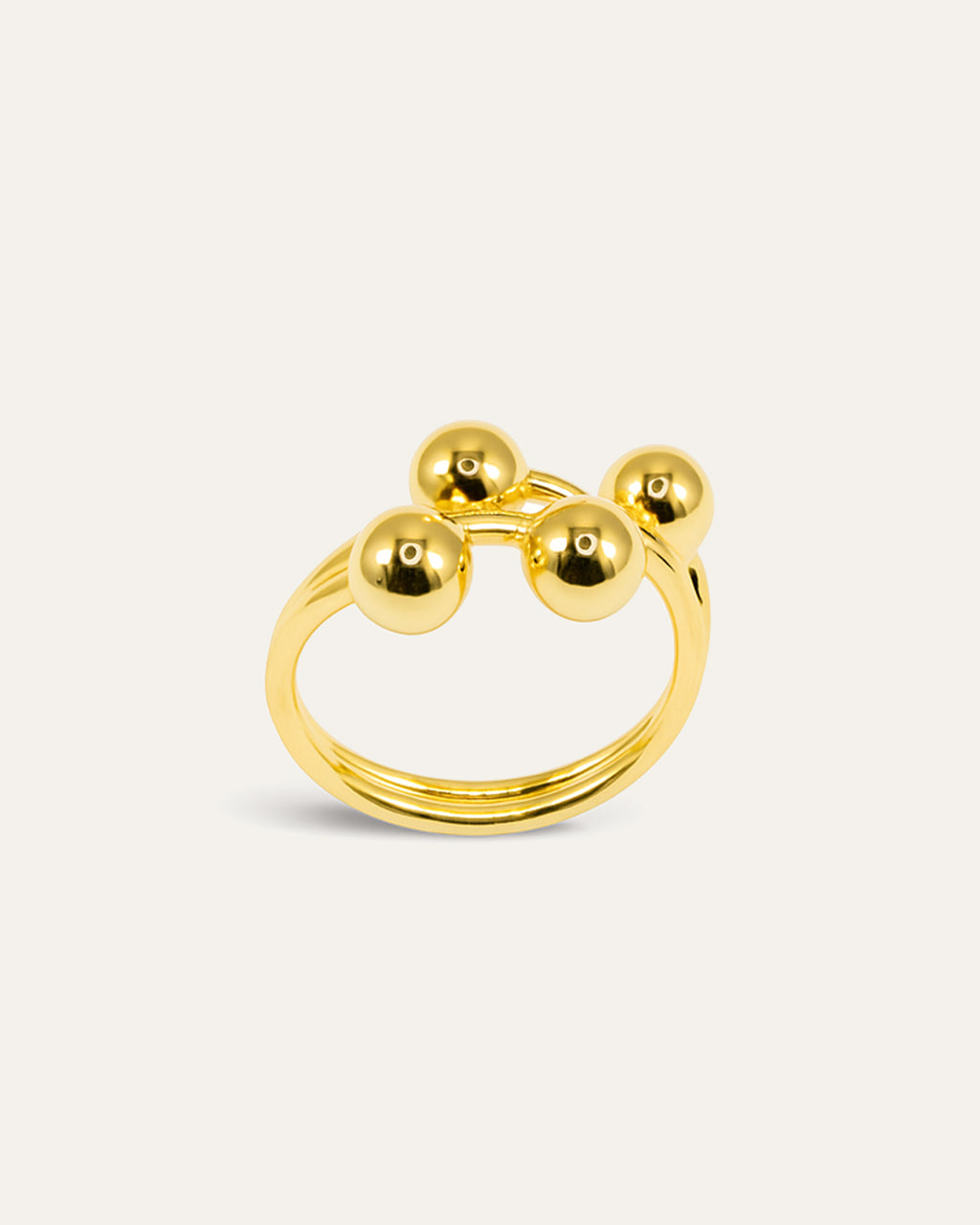Orbit Cluster Ring in polished gold with four spherical orbs – Jadejuri