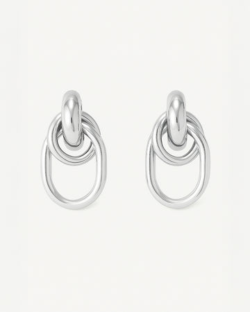 Silver-plated brass hoop earrings with interlocking oval and round links on white background