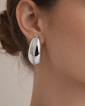 Silver teardrop stud earrings with crystal line on ear minimalist jewelry