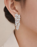 Marquise zirconia leaf drop earrings on ear, rhodium-plated brass