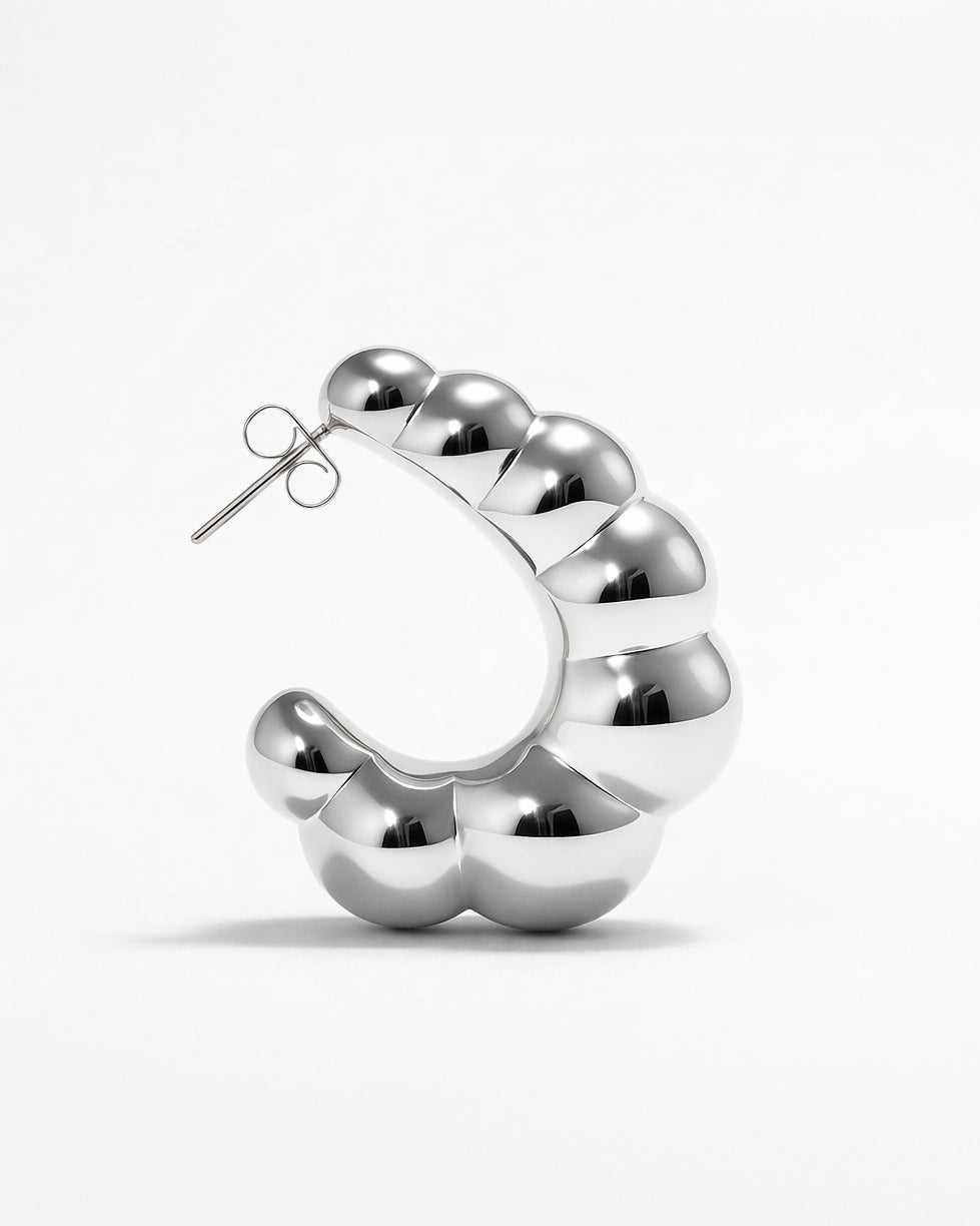 silver-plated puffy hoop earrings top view with bold rounded segments, minimalist chunky hoop earrings