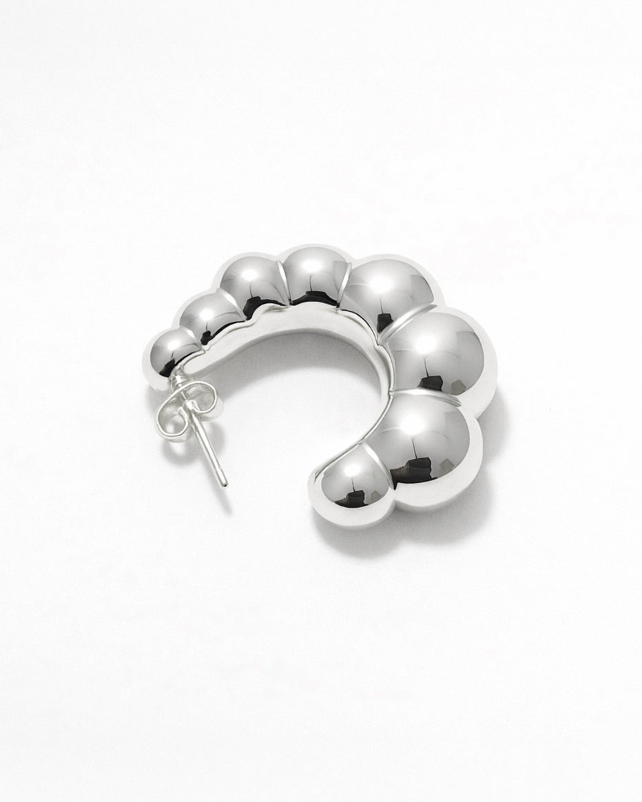 silver-plated puffy hoop earrings top view with bold rounded segments, minimalist chunky hoop earrings