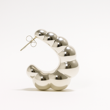 Puffy Shell Hoops in polished silver with inflated sculptural shell-like shape – Jadejuri
