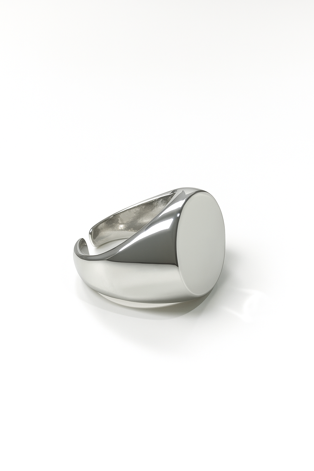 silver-plated signet ring with oval top and open band on white background