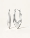 Silver sculpted marquise hoop earrings front view, featuring a polished minimalist design by Jadejuri