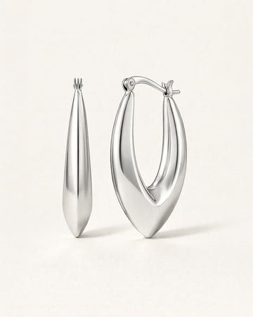 Silver sculpted marquise hoop earrings front view, featuring a polished minimalist design by Jadejuri