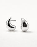 Silver sculpted teardrop stud earrings front view, featuring a polished minimalist design by Jadejuri