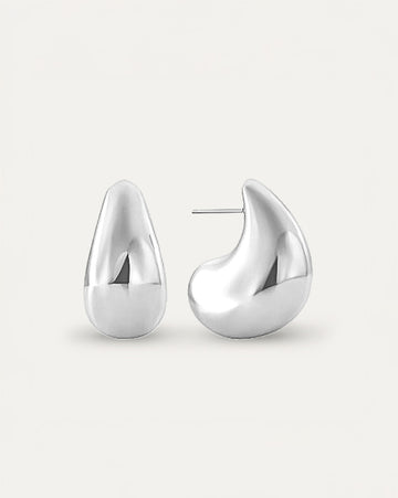 Silver sculpted teardrop-shaped stud earrings with smooth high-polish finish