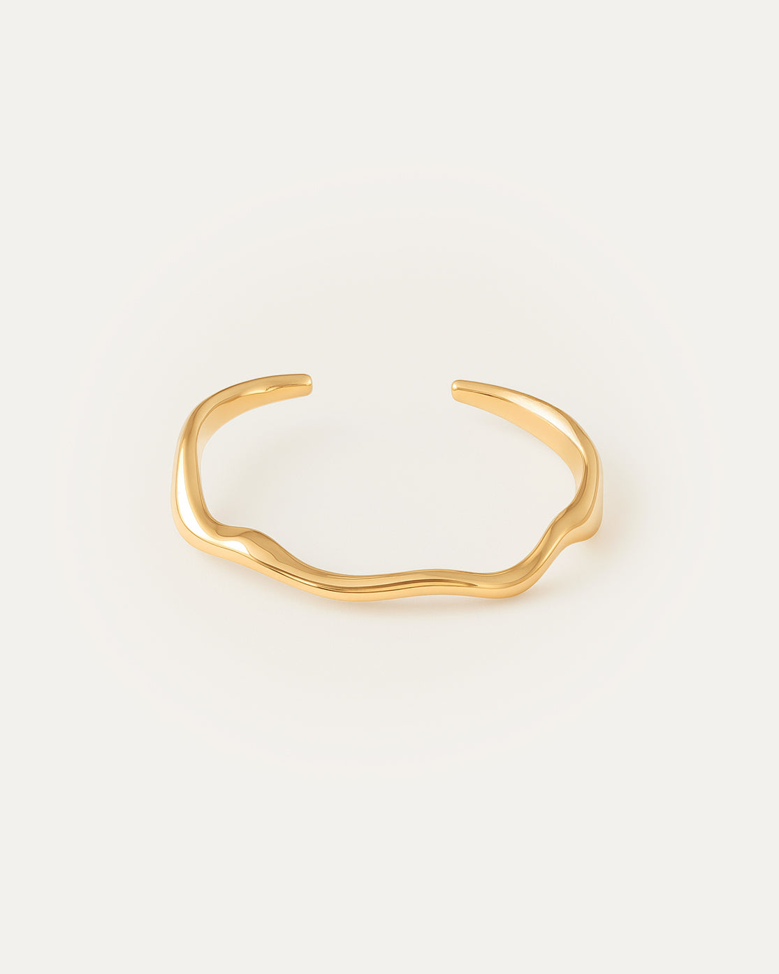 Wavy gold cuff bracelet with fluid, organic shape and smooth finish – Jadejuri
