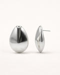 Silver sculpted teardrop stud earrings front view, featuring a smooth polished minimalist design by Jadejuri