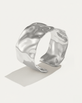 Wavecrest Hammered Cuff bracelet in silver-plated brass with hammered wave texture, wide statement cuff design.